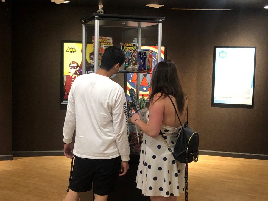 Young couple looks at exhibit