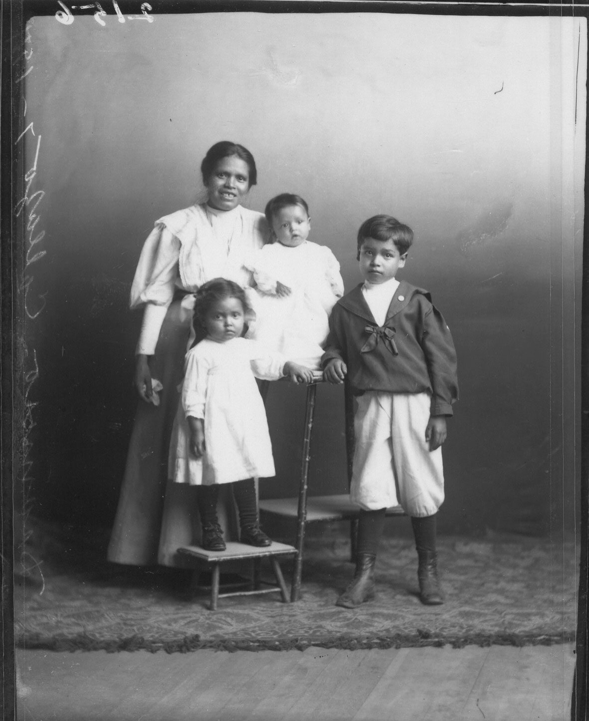 Glass plate negative Hispanic woman and her children