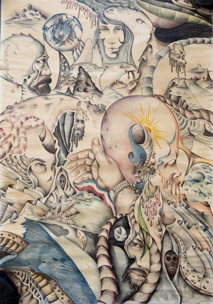Surrealist pencil and colored pencil drawing featuring a complex composition of interwoven human faces, hands, skeletal forms, and abstract landscapes. Imagery includes melting skulls, a bald head with a sunburst, twisting tendrils, and distant mountains under cloudy skies.