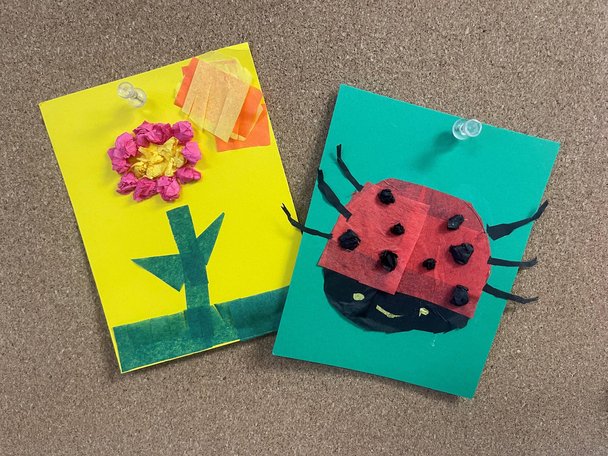 Flower on yellow paper and ladybug on green paper made with tissue paper.